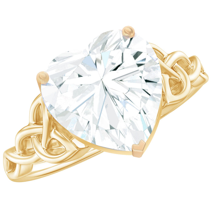 Heart-shaped moissanite Celtic engagement ring by Rosec Jewels, featuring intricate Celtic design and sparkling gemstone.
