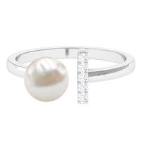 Cultured 3-carat freshwater pearl cuff ring with diamond accents, designed by Rosec Jewels, featuring elegant jewelry craftsmanship.