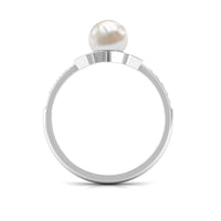Rosec Jewels freshwater pearl solitaire floral engagement ring with diamond, featuring a delicate floral design and elegant band.