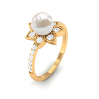 Rosec Jewels freshwater pearl solitaire floral engagement ring with diamond, featuring a delicate pearl and intricate floral design.