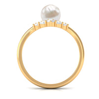 Freshwater pearl and diamond chevron engagement ring by Rosec Jewels featuring a 2-carat cultured pearl centerpiece and elegant design.