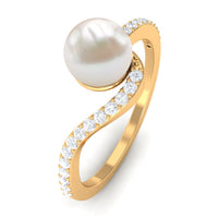 Cultured 2 Carat White Pearl engagement ring with diamond bypass shank by Rosec Jewels, featuring a elegant band and sparkling accents.
