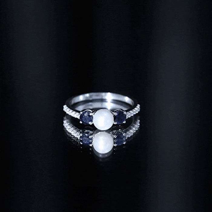 Natural freshwater pearl, blue sapphire, and diamond 3-stone engagement ring by Rosec Jewels, showcasing elegant gemstones and gold setting.