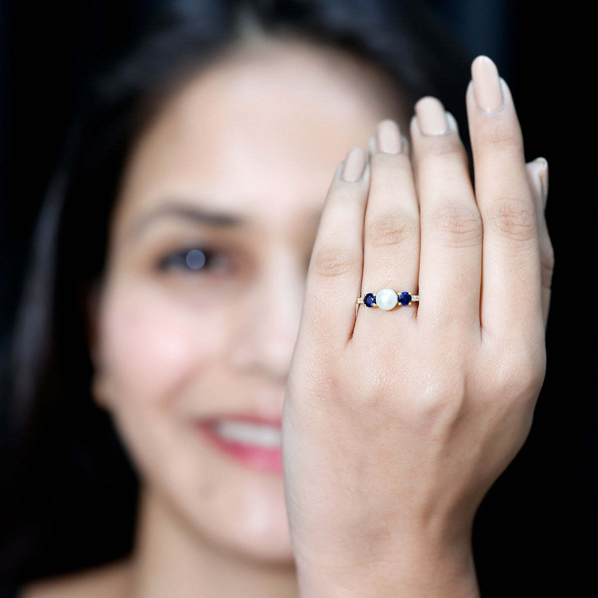 Natural freshwater pearl and blue sapphire 3-stone engagement ring with diamonds, crafted by Rosec Jewels.