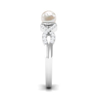 Two-carat freshwater pearl crossover engagement ring with diamonds by Rosec Jewels, featuring elegant pearl and diamond accents.