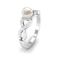 Rosec Jewels 2 Carat freshwater pearl crossover engagement ring with diamond accents, showcasing elegant design and sparkling gemstones.