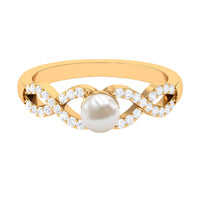Rosec Jewels 2 Carat freshwater pearl and diamond crossover engagement ring, showcasing elegant pearls and sparkling diamonds.