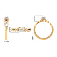 Two-carat freshwater pearl crossover engagement ring with diamonds by Rosec Jewels, featuring elegant white pearl and sparkling accents.