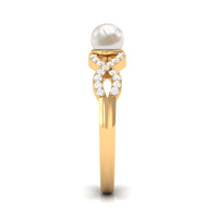Rosec Jewels 2 Carat freshwater pearl crossover engagement ring with diamond accents, showcasing elegant pearl and sparkling diamonds.