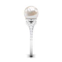 Cultured 7.4 carat freshwater pearl solitaire engagement ring with diamond accents by Rosec Jewels, showcasing a elegant ring design.