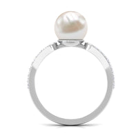Cultured 7.4-carat freshwater pearl solitaire engagement ring with diamond accents, crafted by Rosec Jewels.