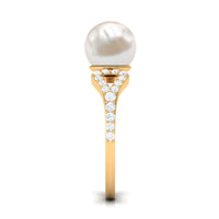 Rosec Jewels cultured 7.4 carat freshwater pearl solitaire engagement ring with diamond, featuring a elegant ring design.