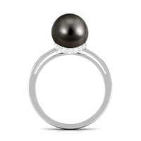 Tahitian pearl solitaire engagement ring by Rosec Jewels featuring a diamond surprise halo and elegant gold band.