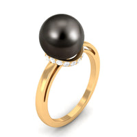 Tahitian pearl solitaire engagement ring with diamond halo from Rosec Jewels, showcasing a pearl center and sparkling halo setting.