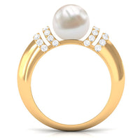 Freshwater pearl solitaire engagement ring with diamond accent, showcasing a Rosec Jewels ring with a 7.48-carat pearl and elegant design.