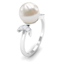 Rosec Jewels natural 7.4 carat freshwater pearl solitaire engagement ring with a diamond setting, showcasing elegant jewelry craftsmanship.