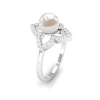 Rosec Jewels real 2 carat freshwater pearl flower engagement ring with diamond, featuring intricate floral design and sparkling accents.