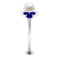 Rosec Jewels 2 Carat freshwater pearl, blue sapphire, and diamond engagement ring showcasing elegant gemstones and craftsmanship.