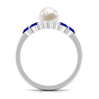 Rosec Jewels 2 Carat freshwater pearl and blue sapphire engagement ring with diamond, showcasing a detailed gold band and elegant design.