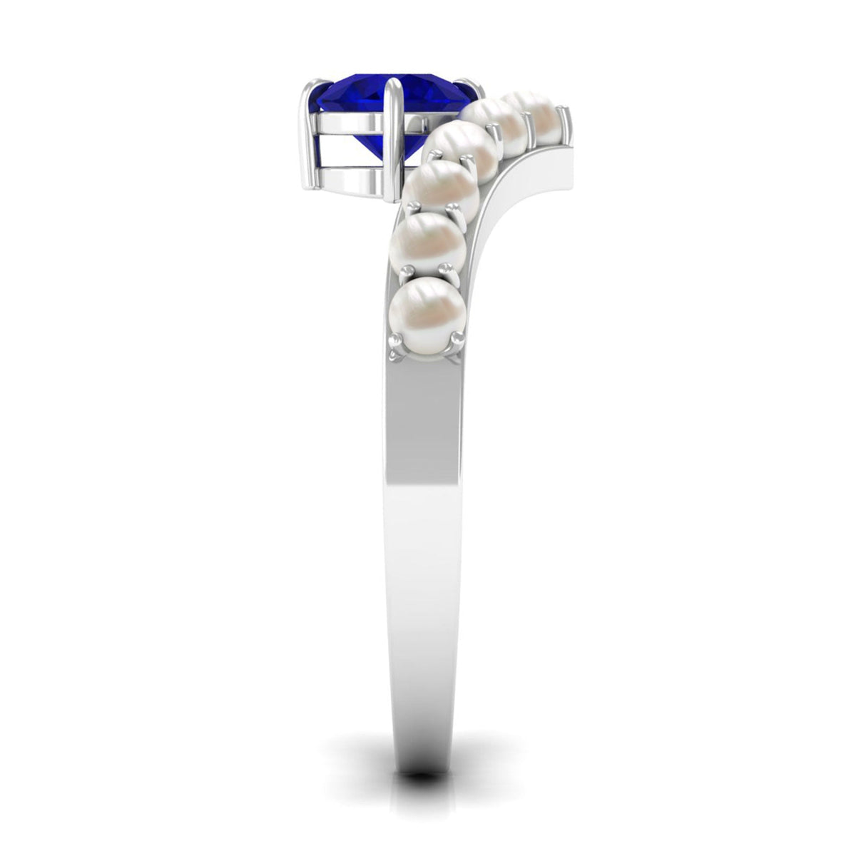 Blue sapphire and freshwater pearl chevron ring by Rosec Jewels, showcasing a 2-carat solitaire blue sapphire with pearl accents.