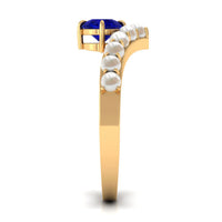 Blue sapphire and freshwater pearl chevron ring with 2 carats, featuring rose gold accents, designed by Rosec Jewels.