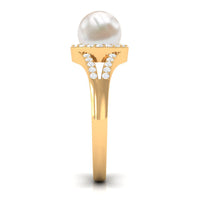 Rosec Jewels freshwater pearl engagement ring with split shank design and diamond halo, featuring elegant craftsmanship and sparkling accents.