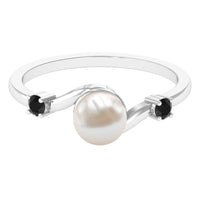 Two-carat freshwater pearl bypass engagement ring with black diamond accents from Rosec Jewels, showcasing elegant design and craftsmanship.