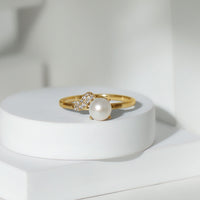 Rosec Jewels cultured 3 carat freshwater pearl solitaire engagement ring with a diamond, showcasing the elegant ring design.