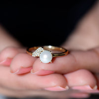 Cultured 3 Carat freshwater pearl solitaire engagement ring with diamond setting by Rosec Jewels, showcasing the elegant ring design.