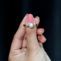 Cultured 3 Carat freshwater pearl solitaire engagement ring with diamond accents from Rosec Jewels, featuring a sleek silver band.