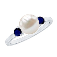 Cultured freshwater pearl engagement ring with blue sapphire accent from Rosec Jewels, showcasing elegant ring design.
