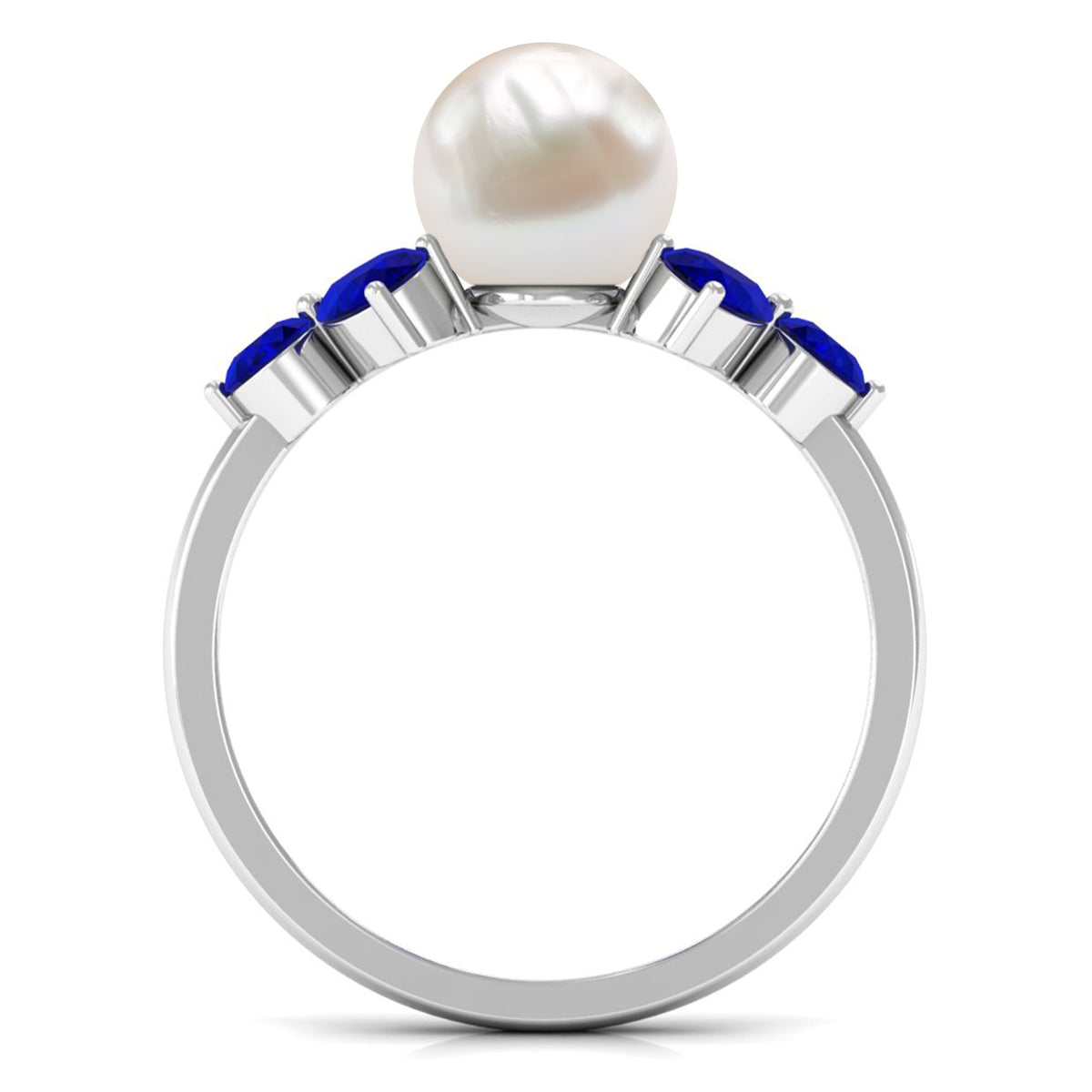 Natural 7.4 carat freshwater pearl engagement ring with blue sapphire trio from Rosec Jewels, featuring a delicate silver band.