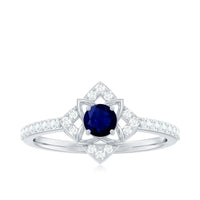 Real blue sapphire and diamond flower engagement ring for women, featuring a detailed ring design with sparkling gemstones.