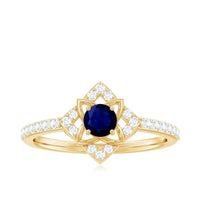 Beautiful blue sapphire and diamond flower engagement ring for women by Rosec Jewels, featuring intricate floral design.