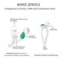 Cultured freshwater pearl and emerald toi et moi promise ring by Rosec Jewels, featuring elegant pearls and vibrant green emeralds.