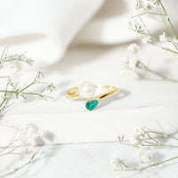 Cultured freshwater pearl and emerald toi et moi promise ring by Rosec Jewels, featuring elegant pearl and green gemstone design.