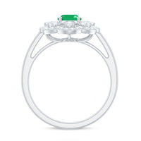 Rosec Jewels 0.7 carat oval emerald engagement ring with diamond accent, featuring a gold band and intricate design details.