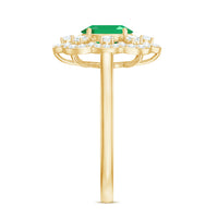 Rosec Jewels 0.7 Carat oval emerald engagement ring with diamond accents, featuring a sleek gold band and intricate design details