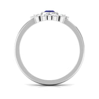 Rosec Jewels blue sapphire flower promise ring with diamond, featuring a detailed sapphire flower and sparkling diamond accents.