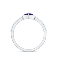 Heart-shaped amethyst and diamond halo engagement ring by Rosec Jewels, showcasing a sparkling gemstone design and intricate details.