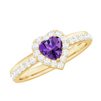 Heart-shaped amethyst and diamond halo engagement ring by Rosec Jewels, featuring a sparkling central gemstone and intricate band details.
