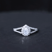 Pear Shape Cubic Zirconia Halo Engagement Ring in Split Shank