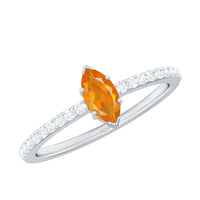 Rosec Jewels 1/2 Ct fire opal marquise engagement ring with diamond accents, showcasing a stunning colorful gemstone setting.