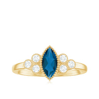 London Blue Topaz Marquise Engagement Ring with Diamond Trio