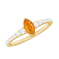 Rosec Jewels 3/4 Carat Marquise Fire Opal engagement ring with diamond accents, showcasing the elegant gemstone and detailed band.