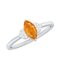 Marquise solitaire fire opal engagement ring with diamond accents by Rosec Jewels, showcasing a striking fire opal centerpiece.
