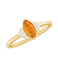 Marquise solitaire fire opal engagement ring with diamond accents by Rosec Jewels, featuring a prominent orange gemstone and elegant setting.