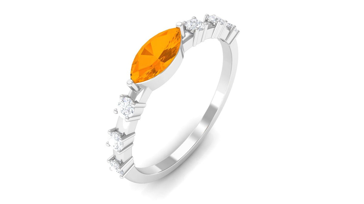 East West Marquise Fire Opal and Diamond engagement ring by Rosec Jewels with a marquise-shaped fire opal and sparkling diamonds.