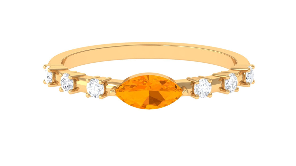 East West Marquise Fire Opal and Diamond engagement ring by Rosec Jewels featuring a marquise fire opal and sparkling diamonds in a rings setting.