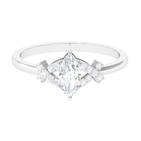 Marquise cut zircon engagement ring with split shank by Rosec Jewels, showcasing sparkling stones and detailed band design.